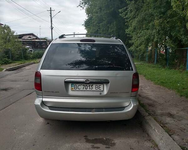 Сірий Крайслер Grand Voyager, об'ємом двигуна 2.5 л та пробігом 217 тис. км за 5180 $, фото 2 на Automoto.ua