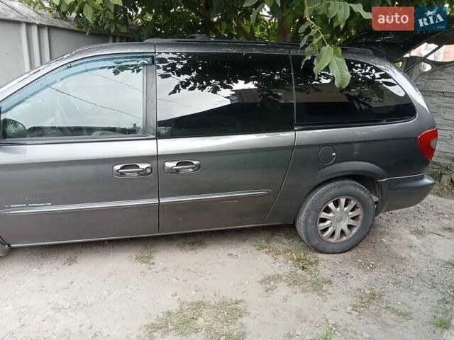 Сірий Крайслер Grand Voyager, об'ємом двигуна 2.5 л та пробігом 532 тис. км за 3999 $, фото 8 на Automoto.ua