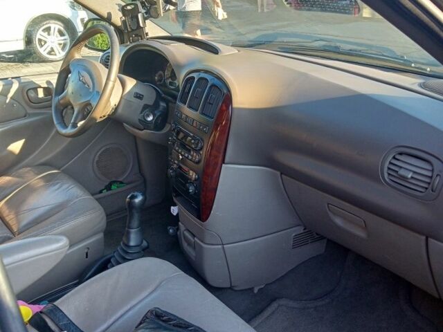 Синій Крайслер Grand Voyager, об'ємом двигуна 2.5 л та пробігом 278 тис. км за 3619 $, фото 6 на Automoto.ua