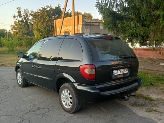 Синій Крайслер Grand Voyager, об'ємом двигуна 2.5 л та пробігом 278 тис. км за 3619 $, фото 1 на Automoto.ua