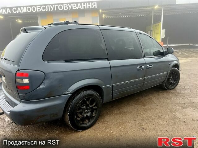 Синій Крайслер Grand Voyager, об'ємом двигуна 2.5 л та пробігом 0 тис. км за 2100 $, фото 1 на Automoto.ua