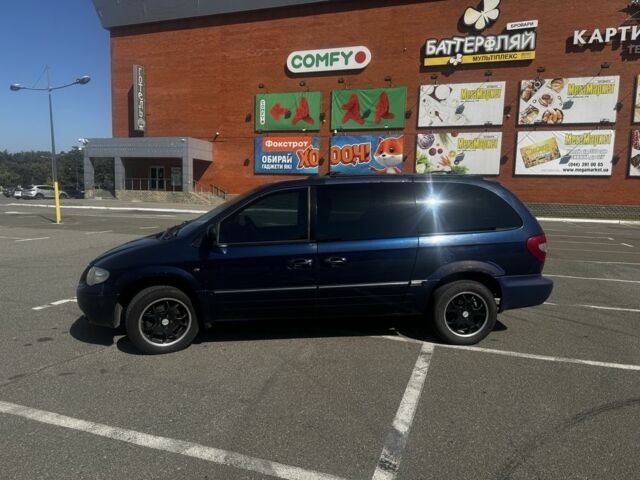 Синий Крайслер Гранд Вояджер, объемом двигателя 2.8 л и пробегом 308 тыс. км за 4500 $, фото 2 на Automoto.ua