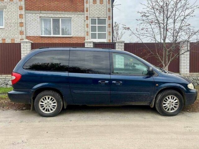 Синій Крайслер Grand Voyager, об'ємом двигуна 0.28 л та пробігом 244 тис. км за 7500 $, фото 4 на Automoto.ua