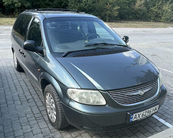 Зелений Крайслер Grand Voyager, об'ємом двигуна 2.5 л та пробігом 315 тис. км за 3800 $, фото 1 на Automoto.ua