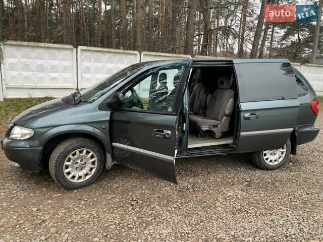 Зелений Крайслер Grand Voyager, об'ємом двигуна 3.3 л та пробігом 353 тис. км за 3450 $, фото 12 на Automoto.ua