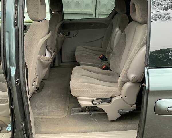 Зелений Крайслер Grand Voyager, об'ємом двигуна 3.3 л та пробігом 353 тис. км за 3450 $, фото 5 на Automoto.ua
