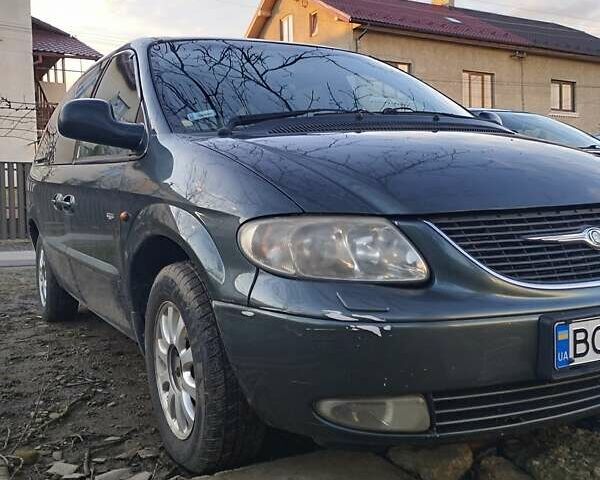 Зеленый Крайслер Гранд Вояджер, объемом двигателя 2.5 л и пробегом 380 тыс. км за 3900 $, фото 1 на Automoto.ua