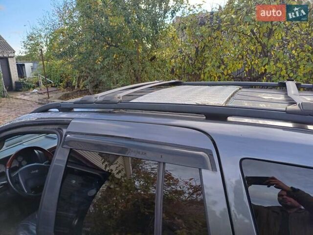 Сірий Крайслер Jeep Cherokee, об'ємом двигуна 4.69 л та пробігом 200 тис. км за 5000 $, фото 8 на Automoto.ua