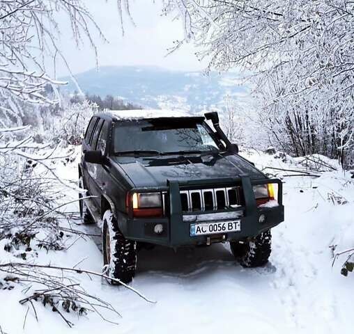 Зеленый Крайслер Джип Чероки, объемом двигателя 2.5 л и пробегом 200 тыс. км за 4500 $, фото 1 на Automoto.ua