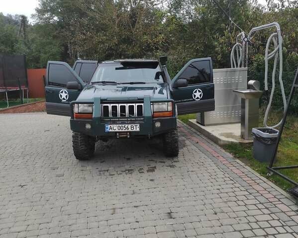 Зеленый Крайслер Джип Чероки, объемом двигателя 2.5 л и пробегом 200 тыс. км за 4500 $, фото 14 на Automoto.ua