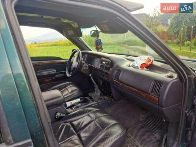 Зеленый Крайслер Джип Чероки, объемом двигателя 2.5 л и пробегом 200 тыс. км за 4500 $, фото 4 на Automoto.ua