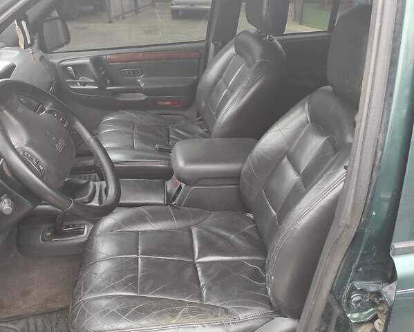 Зеленый Крайслер Джип Чероки, объемом двигателя 2.5 л и пробегом 200 тыс. км за 4500 $, фото 13 на Automoto.ua