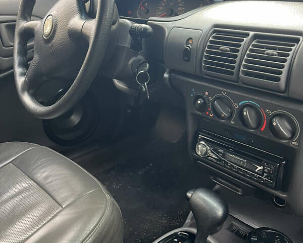 Білий Крайслер Neon, об'ємом двигуна 2 л та пробігом 170 тис. км за 1699 $, фото 14 на Automoto.ua