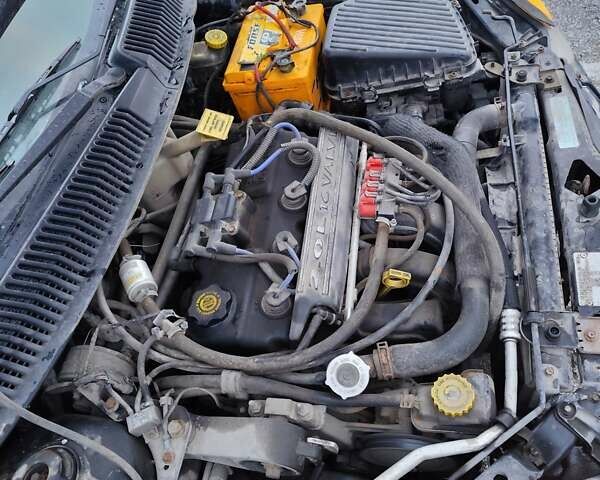 Черный Крайслер Неон, объемом двигателя 2 л и пробегом 320 тыс. км за 1399 $, фото 12 на Automoto.ua