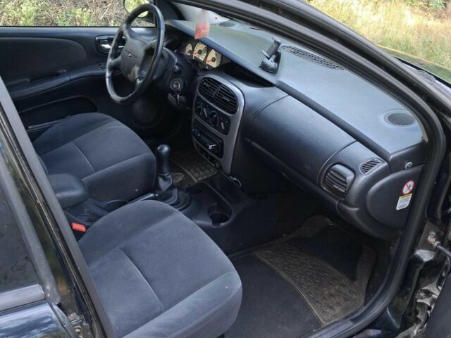 Крайслер Неон 2001 в Ровно на Automoto.ua Черный Крайслер Неон, объемом двигателя 2 л и пробегом 211 тыс. км за 2400 $, фото 11 на Automoto.ua