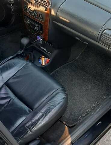 Черный Крайслер Неон, объемом двигателя 2 л и пробегом 265 тыс. км за 4500 $, фото 14 на Automoto.ua