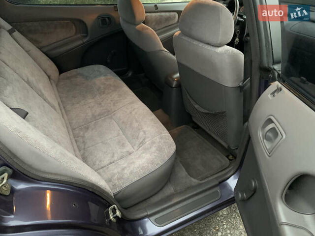 Фіолетовий Крайслер Neon, об'ємом двигуна 2 л та пробігом 187 тис. км за 2650 $, фото 23 на Automoto.ua