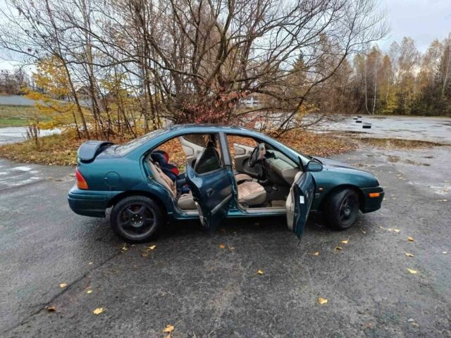 Крайслер Neon 1995 у Житомирі на Automoto.ua Зелений Крайслер Neon, об'ємом двигуна 2 л та пробігом 210 тис. км за 1832 $, фото 6 на Automoto.ua