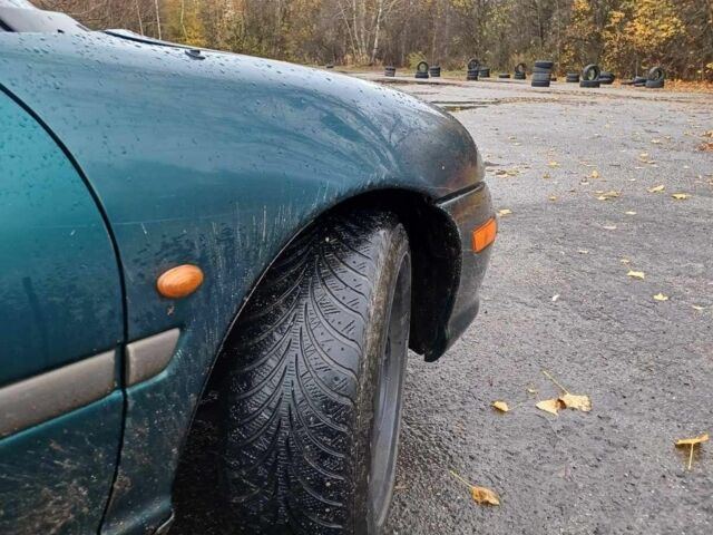 Крайслер Neon 1995 у Житомирі на Automoto.ua Зелений Крайслер Neon, об'ємом двигуна 2 л та пробігом 210 тис. км за 1832 $, фото 9 на Automoto.ua