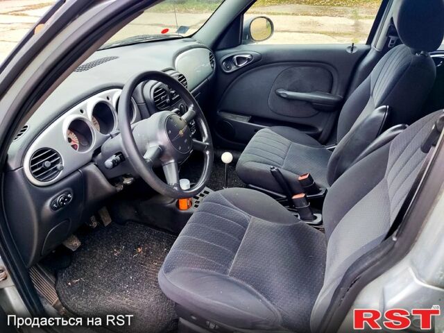 Сірий Крайслер PT Cruiser, об'ємом двигуна 2.2 л та пробігом 321 тис. км за 1900 $, фото 4 на Automoto.ua