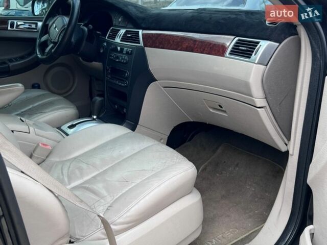 Черный Крайслер Пасифик, объемом двигателя 3.52 л и пробегом 277 тыс. км за 3999 $, фото 7 на Automoto.ua