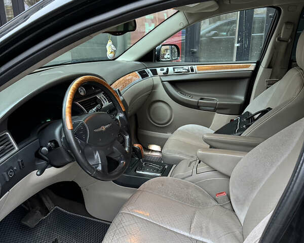 Черный Крайслер Пасифик, объемом двигателя 3.5 л и пробегом 300 тыс. км за 5500 $, фото 11 на Automoto.ua