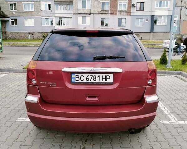 Красный Крайслер Пасифик, объемом двигателя 3.52 л и пробегом 180 тыс. км за 5900 $, фото 1 на Automoto.ua