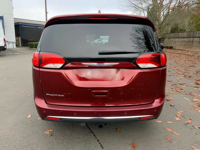 Красный Крайслер Пасифик, объемом двигателя 3.6 л и пробегом 44 тыс. км за 5000 $, фото 4 на Automoto.ua