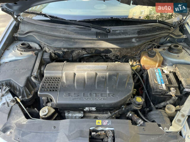 Серый Крайслер Пасифик, объемом двигателя 3.5 л и пробегом 300 тыс. км за 6200 $, фото 12 на Automoto.ua