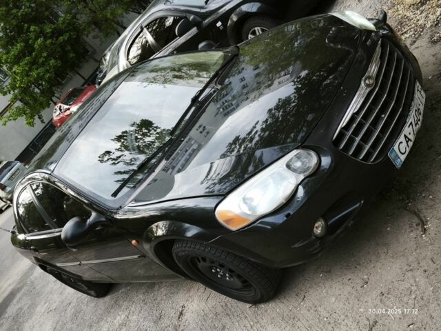 Черный Крайслер Себринг, объемом двигателя 2 л и пробегом 285 тыс. км за 2488 $, фото 1 на Automoto.ua