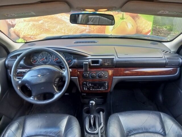 Желтый Крайслер Себринг, объемом двигателя 0 л и пробегом 250 тыс. км за 2798 $, фото 3 на Automoto.ua