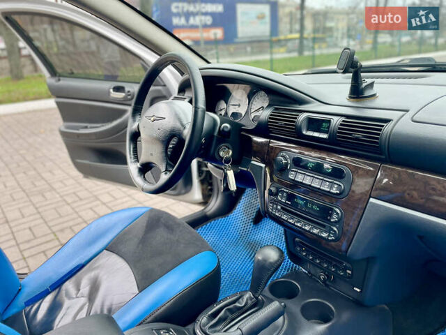 Серый Крайслер Себринг, объемом двигателя 2.7 л и пробегом 358 тыс. км за 3199 $, фото 23 на Automoto.ua