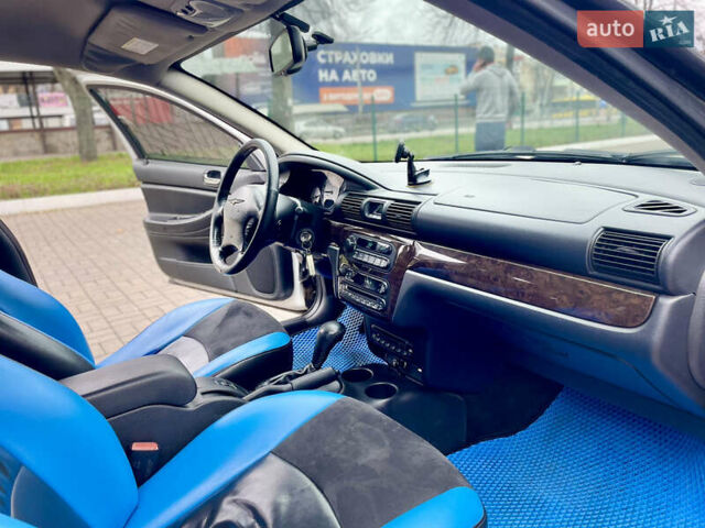 Серый Крайслер Себринг, объемом двигателя 2.7 л и пробегом 358 тыс. км за 3199 $, фото 22 на Automoto.ua