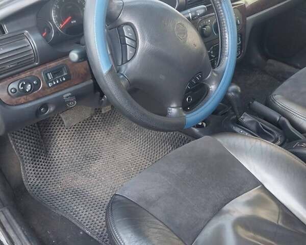 Крайслер Себрінг 2003 у Голованевске на Automoto.ua Сірий Крайслер Себрінг, об'ємом двигуна 2 л та пробігом 175 тис. км за 2399 $, фото 11 на Automoto.ua