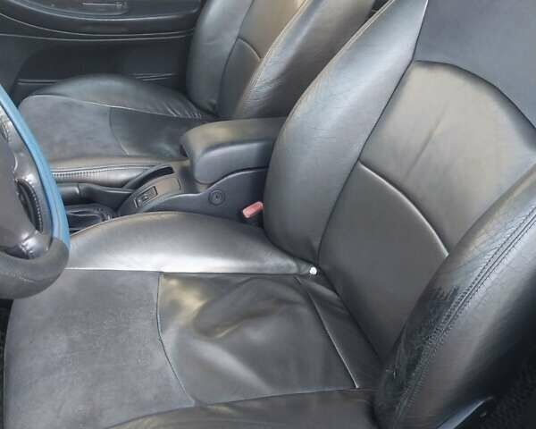 Крайслер Себрінг 2003 у Голованевске на Automoto.ua Сірий Крайслер Себрінг, об'ємом двигуна 2 л та пробігом 175 тис. км за 2399 $, фото 12 на Automoto.ua