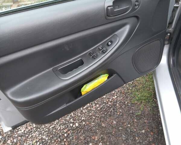 Серый Крайслер Себринг, объемом двигателя 2.7 л и пробегом 118 тыс. км за 3700 $, фото 6 на Automoto.ua