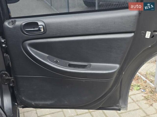 Сірий Крайслер Себрінг, об'ємом двигуна 2 л та пробігом 200 тис. км за 2500 $, фото 12 на Automoto.ua