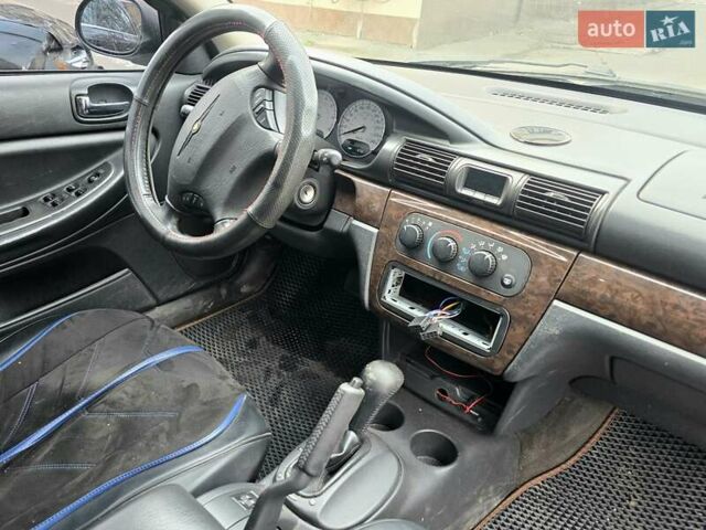 Сірий Крайслер Себрінг, об'ємом двигуна 2 л та пробігом 200 тис. км за 2500 $, фото 17 на Automoto.ua