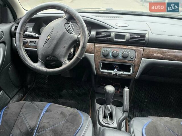 Сірий Крайслер Себрінг, об'ємом двигуна 2 л та пробігом 200 тис. км за 2500 $, фото 14 на Automoto.ua