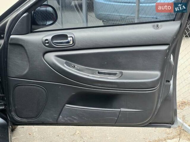 Сірий Крайслер Себрінг, об'ємом двигуна 2 л та пробігом 200 тис. км за 2500 $, фото 15 на Automoto.ua