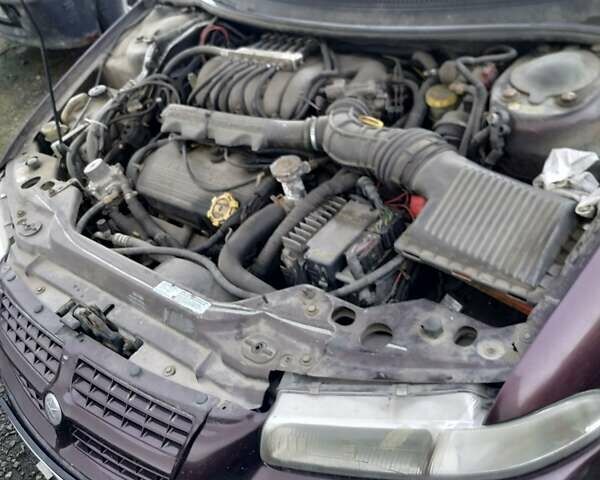 Белый Крайслер Статус, объемом двигателя 2.5 л и пробегом 260 тыс. км за 1100 $, фото 6 на Automoto.ua