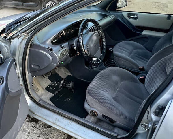 Сірий Крайслер Stratus, об'ємом двигуна 2 л та пробігом 370 тис. км за 1750 $, фото 4 на Automoto.ua