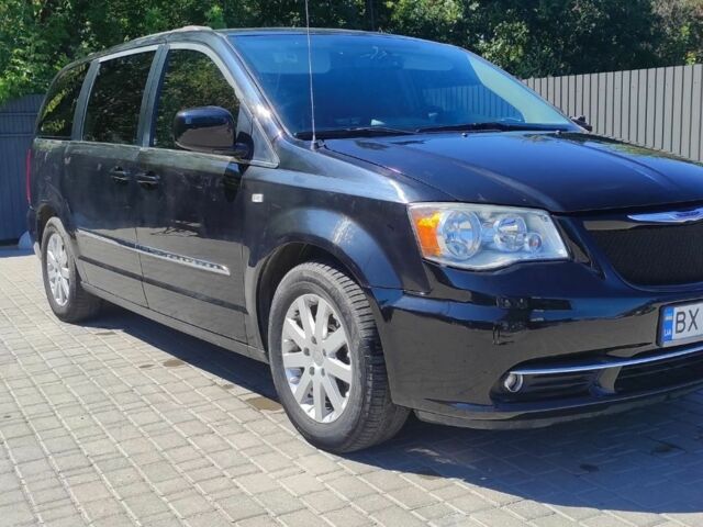 Крайслер Town & Country 2014 у Каменце-Подольском на Automoto.ua Чорний Крайслер Town & Country, об'ємом двигуна 3.6 л та пробігом 223 тис. км за 10800 $, фото 1 на Automoto.ua
