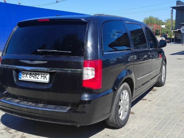 Крайслер Town & Country 2014 у Каменце-Подольском на Automoto.ua Чорний Крайслер Town & Country, об'ємом двигуна 3.6 л та пробігом 223 тис. км за 10800 $, фото 2 на Automoto.ua