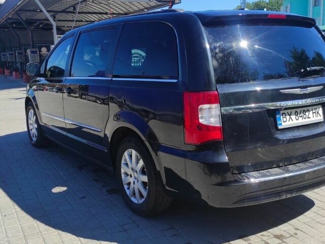Крайслер Town & Country 2014 у Каменце-Подольском на Automoto.ua Чорний Крайслер Town & Country, об'ємом двигуна 3.6 л та пробігом 223 тис. км за 10800 $, фото 3 на Automoto.ua