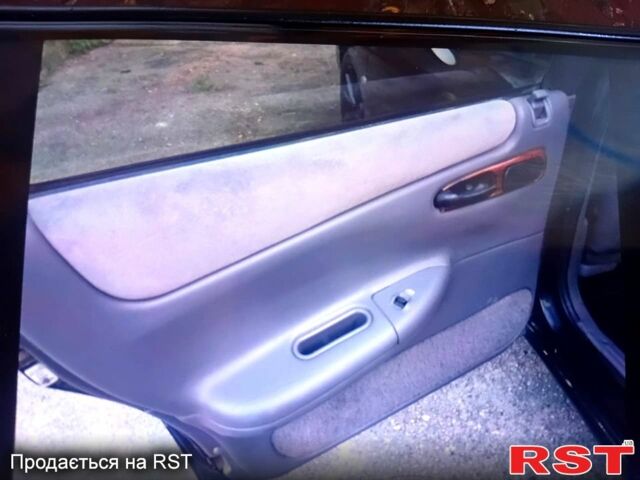 Черный Крайслер Вижн, объемом двигателя 3.5 л и пробегом 208 тыс. км за 2900 $, фото 2 на Automoto.ua