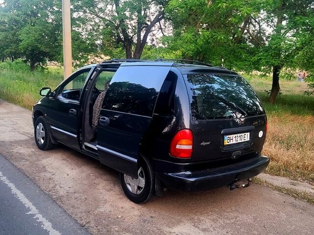 Крайслер Вояджер 1999 в Херсоне на Automoto.ua Черный Крайслер Вояджер, объемом двигателя 2.5 л и пробегом 302 тыс. км за 3450 $, фото 2 на Automoto.ua