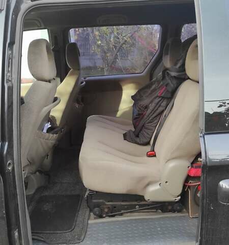 Черный Крайслер Вояджер, объемом двигателя 2.5 л и пробегом 342 тыс. км за 4500 $, фото 6 на Automoto.ua