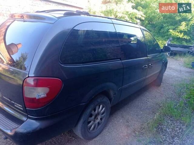 Черный Крайслер Вояджер, объемом двигателя 2.5 л и пробегом 390 тыс. км за 2800 $, фото 2 на Automoto.ua