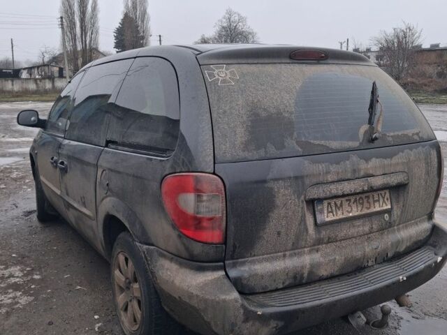 Черный Крайслер Вояджер, объемом двигателя 2.5 л и пробегом 1 тыс. км за 1538 $, фото 5 на Automoto.ua